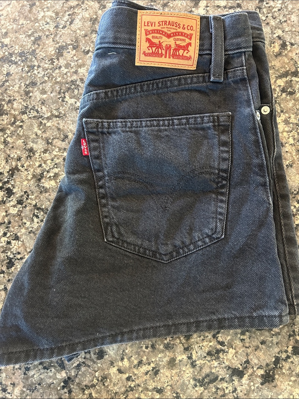 Levi's womens high waisted Mom shorts in Washed Black Denim